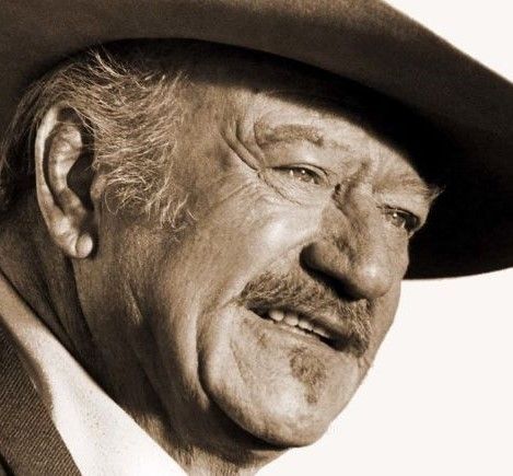 Primerísimo primer plano de un vaquero anciano con bigote.